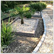 There are two tiers of brick with this edging design that utilizes different colored bricks and heights to create a beautiful edge. Diy Brick Garden Borders And Edging Pinspired To Diy