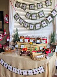 Set up a display of books that relate to the theme by standing them on a counter or shelf. Camping Birthday Party Theme Sebastian S 5th Birthday