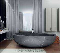 This bathroom features a stylish tiles flooring and marble walls. Modern Stone Marble Freestanding Bathtub From China Stonecontact Com