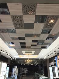 False Ceiling At Watch Showroom At Jaipur Designed By Arpan Design Wooden Ceiling Design False Ceiling Design Ceiling Materials