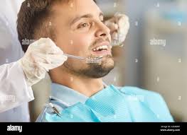 During dental exam hi-res stock photography and images