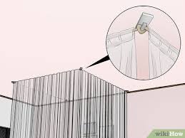 You will likely need more than one track rail to cover each side of the bed. How To Hang Curtains Around A Bed Without Drilling 11 Steps