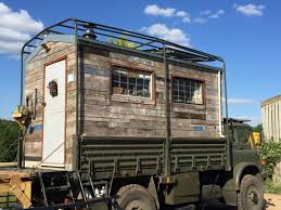 Couple Transform Old Army Truck Into 72 Square Foot Off Grid Home On Wheels Army Truck Truck House House On Wheels