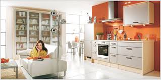 بالصور تصميمات لمطابخ عصرية تطل على غرفة المعيشة البرتقالى الصاخب والليمونى أبرز ألوانها الجذابة تمنح لغرفة المعيشة الحياة والبهجة وتزيد من اتساع غرفة المعيشة وأناقتها والبار جزء أساسى منها اليوم السابع