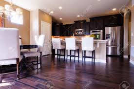 Check spelling or type a new query. Modern Kitchen With Dark Wood Cabinets And Hardwood Floors Stock Photo Picture And Royalty Free Image Image 15079355