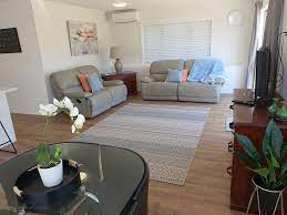 The master bedroom has a large ensuite bathroom that features twin hand basins, a luxurious bath and separate shower stall. Private 2 Bedroom Apartment Castor Bay Auckland Apartment Auckland