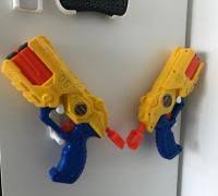 Space out 2 pegs at approximately the same length as attach an s hook to the towel rack for each nerf gun you want to hang, spacing them out evenly along the rail. Nerf Gun Wall Mount 3d Models To Print Yeggi
