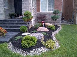 Wonderfully maintained traditional style landscaping with two stone post entrances and flagstone. Front Yard Landscaping Ideas Toronto Google Search Front Yard Landscaping Design Landscaping With Rocks Landscape Design