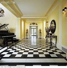 Black And White Checkered Floor Entry Entry Ways Elegant Formal Entrance Hall Yellow Walls Baby Grand Piano Black And White Checkered Floor Yellow Walls Black And White Tiles White Tile Floor