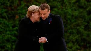 In a video of the incident, reporters called for trump and merkel to shake hands at the end of the photo op, as is customary during meetings. Macron And Merkel Link Hands For Armistice Centenary Tributes News The Times