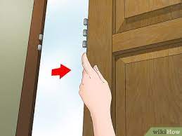 My cabinets are rough & unfinished on the inside which. How To Paint Oak Doors White With Pictures Wikihow