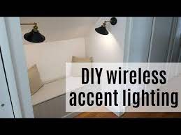 How To Add Accent Lights Without Power Or Cords With This Diy No Wire Sconce Lights Magic Light Hack Add Sconce Lighting Wire Wall Sconces Wall Sconces Diy