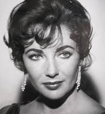 Elizabeth Taylor was not only a captivating beauty but also an incredibly  talented actress whose career spanned decades. From her early role in  *National Velvet* to her Oscar-winning performances in *Butterfield 8*