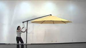 All types of parasols provide shade that makes it more pleasant to sit in an outdoor area. Side Mount Cantilever Outdoor Umbrella Youtube