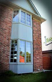 Upvc cladding that can enhance the appearance of your orpington home. Wood Clad Aluminum Bay Windows Gray Aluminum Cladding On The Exterior Stained Pine Inside Cross Aluminu Bay Window Design Bay Window Exterior House Exterior