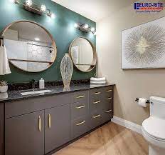 Our Fab Dealers Federated Co Op Used Our Pacific Thermofoil Super Matte Charcoal Cabinetry From Tou Round Mirror Bathroom Bathroom Makeover Gorgeous Bathroom