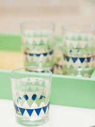 On the table, three small glasses of beer were arranged next to one another to form a triangle. Cute Durable Dorm Room Glasses With White Mint And Blue Triangle Stripes Hgtv