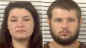 Infant kept in cage in Mars Hill, man and woman charged with child abuse