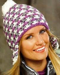 шапки ушанки вязаные спицами женские с описанием и фото Cvetnaya Shapka Ushanka S Pomponom Uzory Dlya Vyazanyh Golovnyh Uborov Idei Dlya Vyazaniya Vykrojki Shlyap