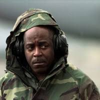 US Air Force (USAF) Major (MAJ) Mark Naumann, Program Manager, Airlift  Defensive Systems (ADS), Headquarters (HQ) Air Mobility Command (AMC),  Scott Air Force Base (AFB), Illinois (IL), watches aircraft from all over