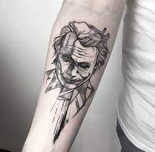 50 Joker Tattoo Designs And Meaning Explained Tats N Rings Joker Tattoo Design Tattoos For Guys Origami Tattoo