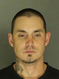 Feds charge man in armed bank robbery