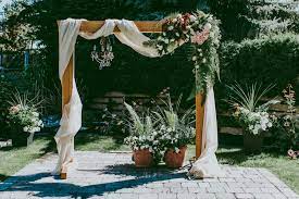 All of these materials can also be used to decorate a wedding arbor, chuppah, or floral arch. With Fabric And Flowers Wedding Arch Diy Arch Decoration Wedding Diy Wedding Arch Wooden Wedding Arches