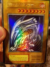 Feel the card, if it feels waxy it's probably fake. Images Of Fake Yugioh Cards Blue Eyes White Dragon