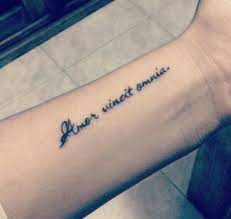 Tattoomagz tries to bring you only the best of the best, with teams that are consistently compiling new photos of the most popular, top voted, most viewed, and most shared tattoo designs and ink jobs. Amor Vincit Omnia Tattoo Love Conquers All Tattoo Tattoos All Tattoos Couple Tattoos Love