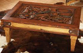 Rustic barnwood timber coffee table. Hand Carved Western Coffee Table With Glass Top