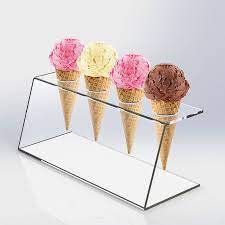 Display material for ice cream parlors comes in all shapes and sizes including large cones. Acrylic Ice Cream Cone Stand Luminati