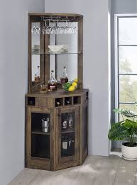 This sleek black piece has smooth bifold cabinet doors and modern metallic accents. Cs303 Bar Table 182303 Coaster Furniture Bar Tables In 2021 Corner Bar Cabinet Bar Cabinet Corner Bar
