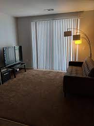 If you have a small living room with a wooden floor try using a matching color scheme for the furniture to open up the. First Time Living Alone Any Advice For Color Scheme Or Rug To Match Brown Carpet All Suggestions Welcome Malelivingspace