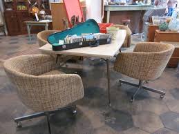 Mid Century Dining Table With Funky Rolling Chairs Sold Paper Street Market Comfortable Dining Chairs Dining Room Chairs Casual Dining Rooms