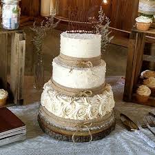 3 Tier Wedding Cake With Alternating Tiers Of Roses Rustic And Swirled Buttercream Finish Tiered Wedding Cake Wedding Cake Rustic Country Wedding Cake Rustic