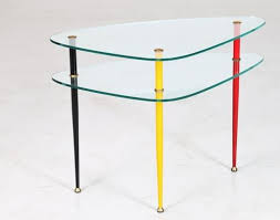 Coffee table books are the perfect accessory for your living room. Edoardo Paoli Coffee Table Mod Arlecchino Mutualart