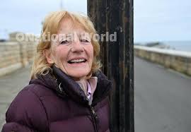 38891385-Les and Joyce Betts having a brew in the sunshine at the Headland.  Picture by FRANK REID