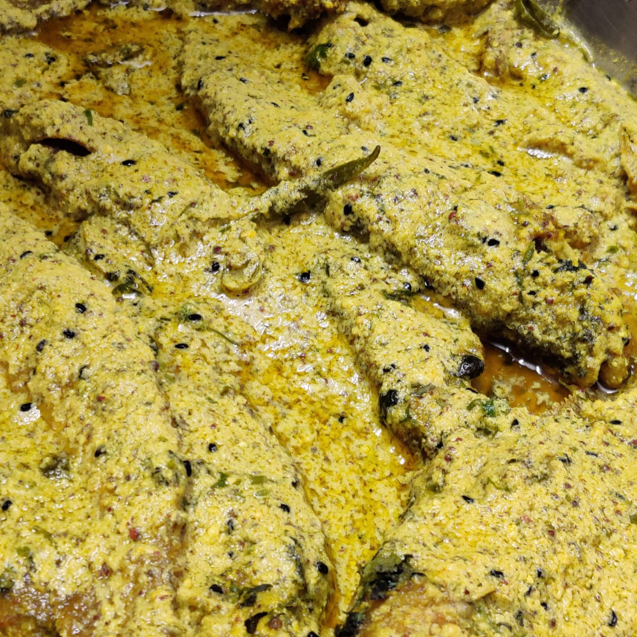 SORSHE BATA FISH (FISH COOKED IN TRADITIONAL MUSTARD GRAVY product image