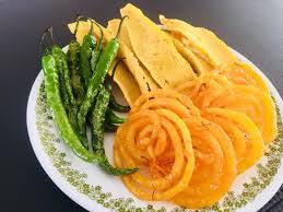 Spicy Fafda with Jalebi - Fafda dusted with spicy masala, served with sweet jalebi and chutney