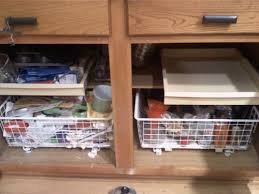 Rather than replacing the cabinets completely, the homeowners is merely improving the old ones already installed in his or her kitchen. Any Idea How To Organize Inside These Deep Kitchen Lower Cabinets