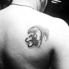 The tattoo appears in a circular motion tatted in solid grey and black ink. 50 Mexican Eagle Tattoo Designs For Men Manly Ink Ideas