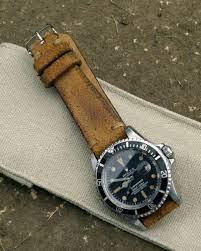 «our new ebony gold minimalist with gold hands and indices, featuring 100% ebony wood dial! Minimalist Ebony Gunny Straps Official Fast Response Guaranteed