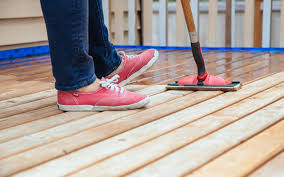 What's the best way to refinish a wood deck? Staining Or Restaining Your Deck Part 1 Timing And Tips For Best Results