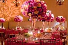 Beauty and colorful spring flowers are perfect for making centerpieces. Fuchsia Yellow And Orange Wedding Floral Centerpieces Photo By Yvette Roman Photography Wedding Inspiration Board Junebug Weddings