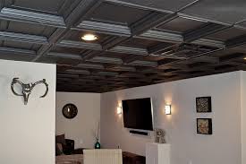 The ease of installation will depend on how the joists are laid out, the type of joists, and how services and utilities are run through and between joists. Easy Basement Install Of Black Madison Coffered Ceiling Tiles Basement Ceiling Ceiling Tiles Basement Ceiling Tiles