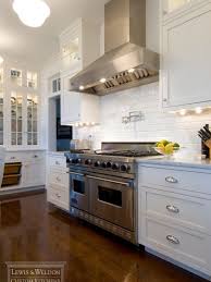 White Cabinets With Glass Fronts Shiny Chrome Bin Pulls Fancy Tiles Home Kitchens Custom Kitchens Kitchen Inspirations