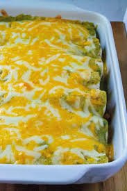 Test cook erin mcmurrer makes the perfect roasted poblano and black bean enchiladas for bridget. Breakfast Enchiladas With Poblano Sauce A Wicked Whisk