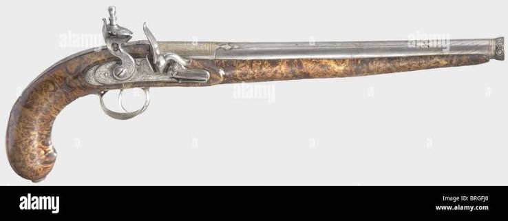A Persian flintlock pistol,circa 1810 Round,smooth bore Damascus barrel in 14 mm calibre with a cannon muzzle.The top of the barrel is cut with arabesque decoration and is stamped with an Arabic