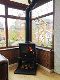 Log Burner In Conservatory Google Search Log Burner Contemporary Garden Rooms Wood Burning Stove