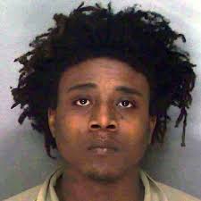 Two charged in shooting of child